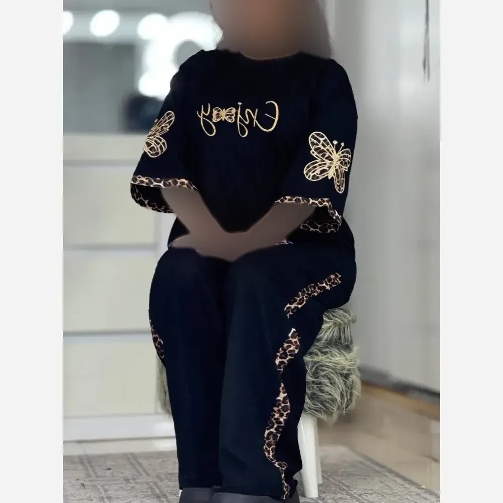 ست تیشرت و شلوار زنانه مدل گیلدا جنس پنبه گلکسی رنگ مشکی فری سایز 38 تا 48