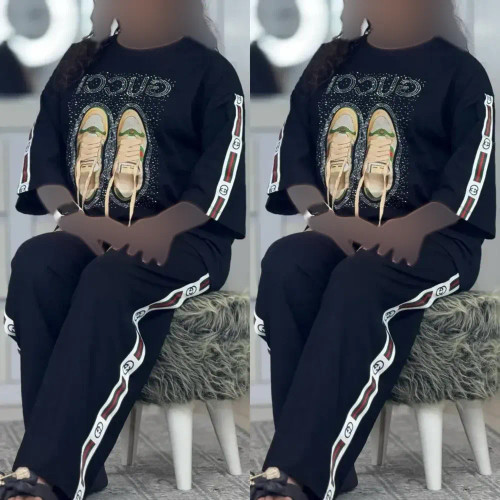 ست تیشرت و شلوار زنانه جنس پنبه گلکسی رنگ مشکی فری سایز 38 تا 46