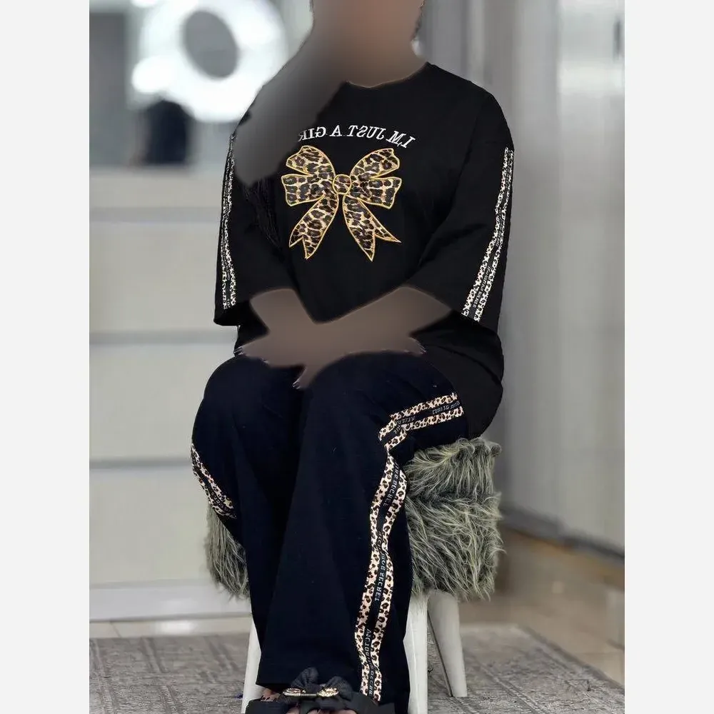 ست تیشرت و شلوار زنانه مدل شاین جنس پنبه گلکسی رنگ مشکی فری سایز 38 تا 46