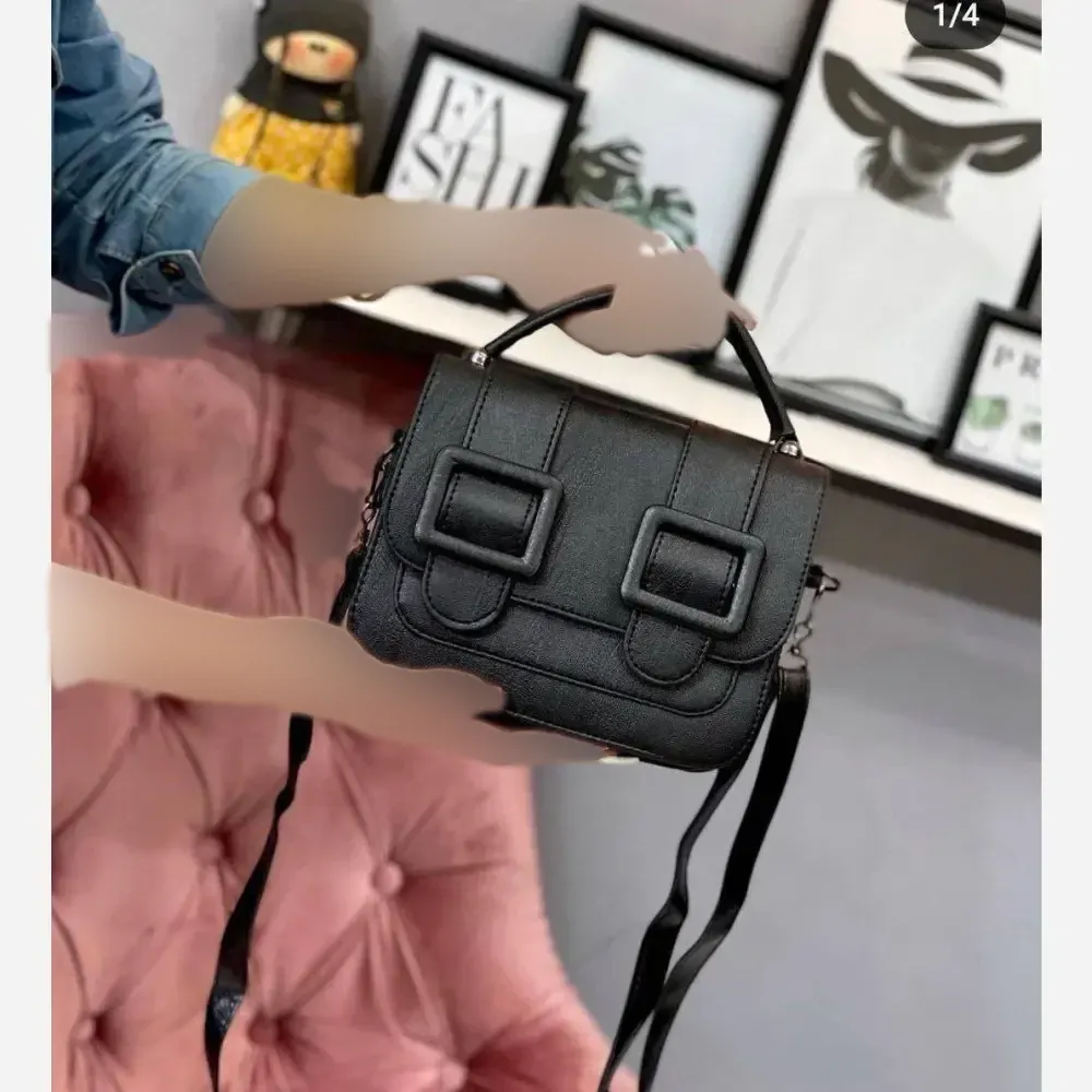کیف دوشی زنانه هانیس جنس چرم رنگ مشکی ابعاد 22 در 18 سانتیمتر با بند بلند