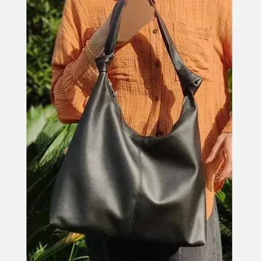 کیف چرم بند گره ای زنانه مشکی موکا سایز 30*40 سانت سبک جادار با کیفیت عالی
