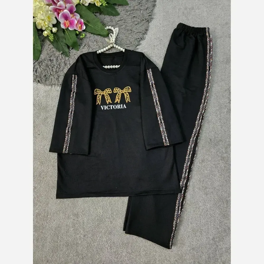 ست تیشرت و شلوار زنانه پنبه گلکسی رنگ مشکی سایز فری 36 تا 48 آرتینا