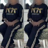ست تیشرت و شلوار زنانه پنبه گلکسی رنگ مشکی سایز فری 36 تا 48 آرتینا