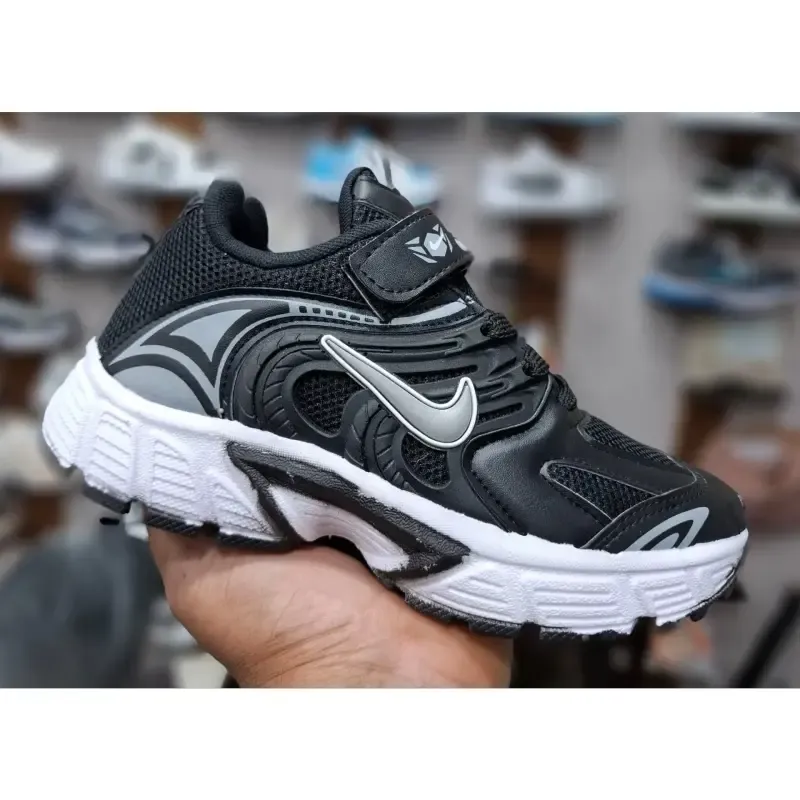 کفش اسپرت بچگانه مشکی و سفید سایز 31 تا 35 پسرانه دخترانه مناسب مدرسه